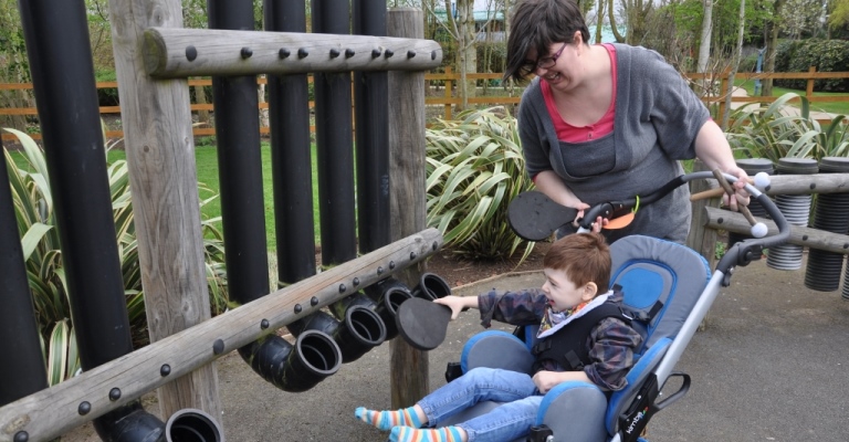 Malachi in the sensory garden at Acorns